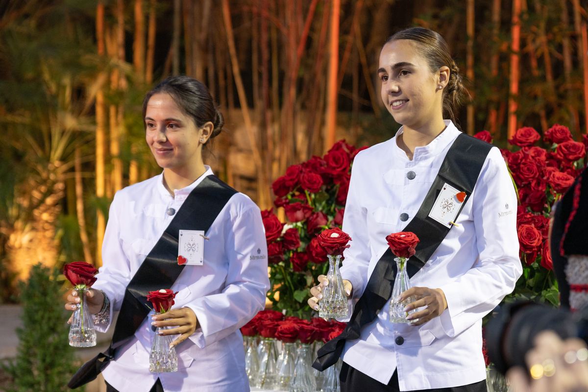 Floor staff with the roses for guests