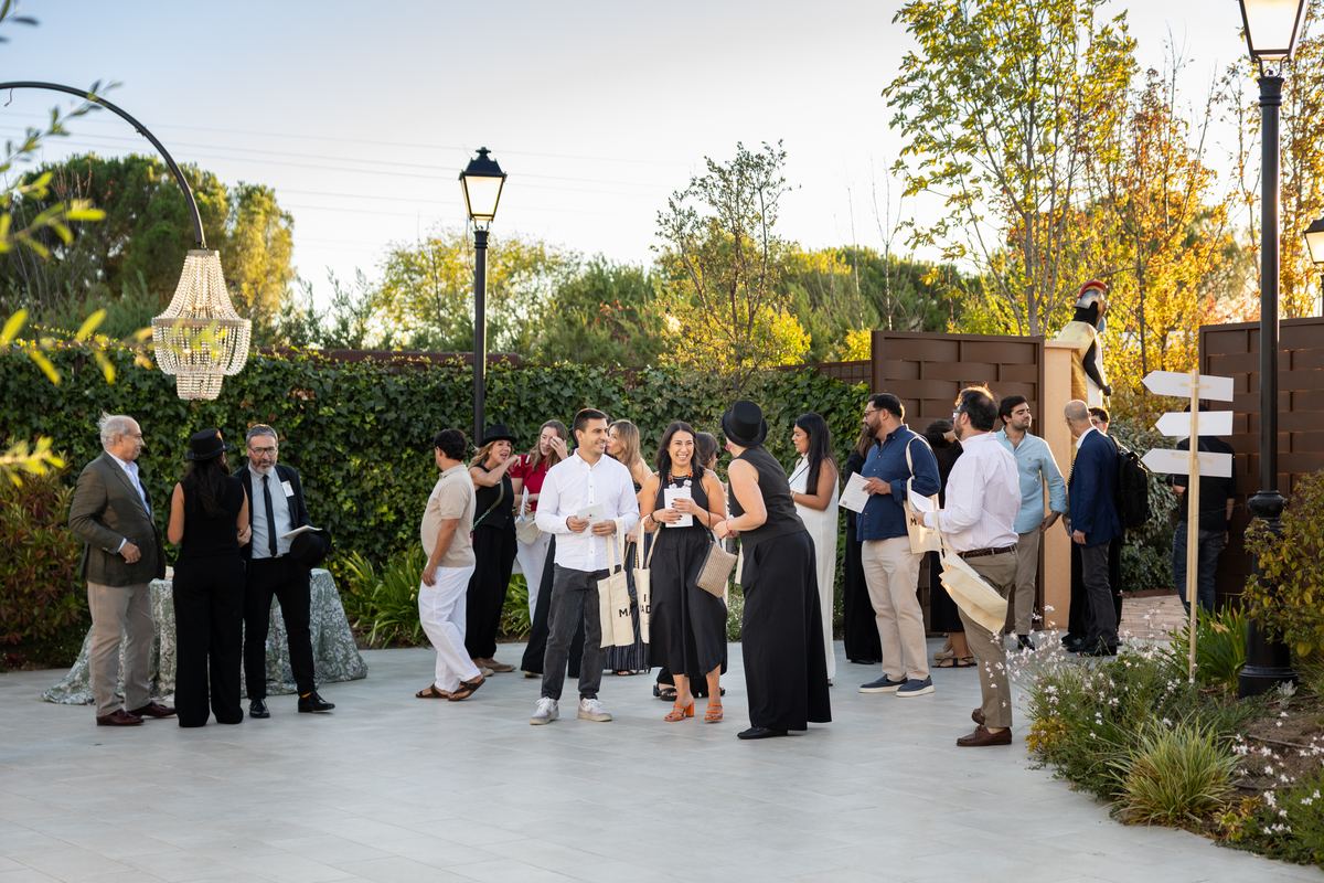 Guests arriving in the gardens at Miravalle at sunset