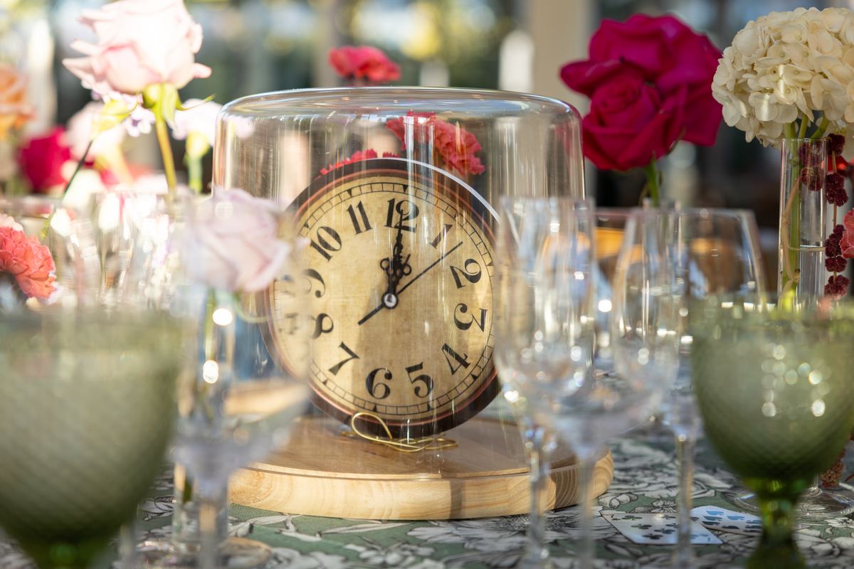 Antique clock under a glass dome as a centrepiece in The Gallery