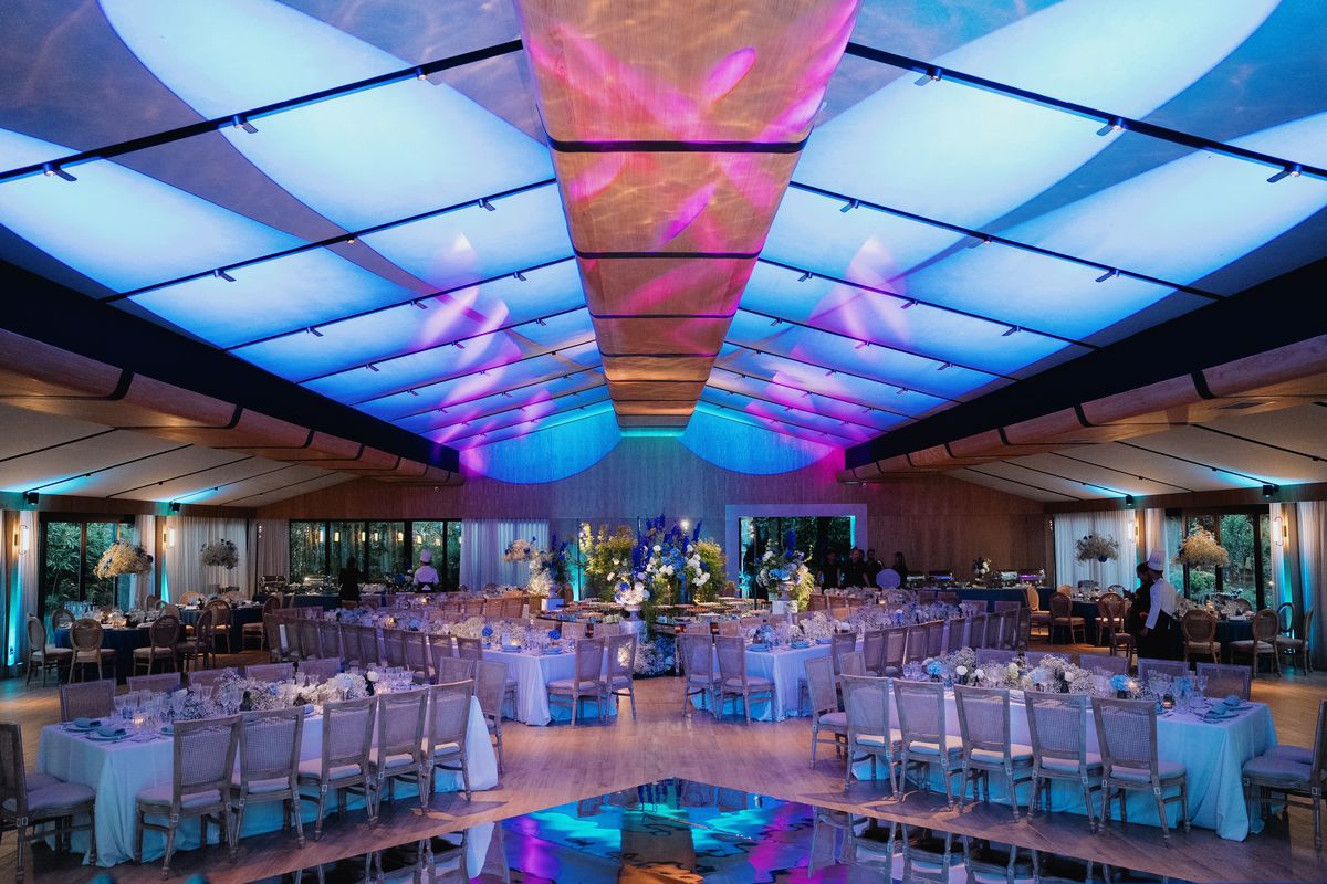 The banquet hall lit up for the party